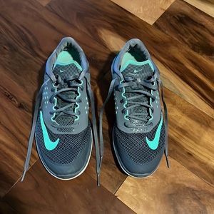 Womens US 9 Nike shoes gray pattern mint accents. Lightweight. Great used shape!